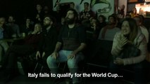 Italy fans watch team crash out of World Cup