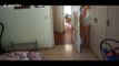 Woman plays hide and seek with her three dogs