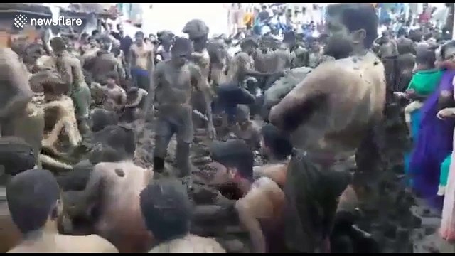 Villagers atone for ancestors' sins with massive cow-dung fight