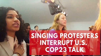 Watch the moment singing protesters interrupt U.S. panel at COP23