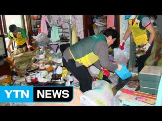 15톤 쓰레기 더미 속 가족 구출한 이웃 / YTN (Yes! Top News)