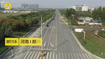 Two power line poles are left in the middle of the street