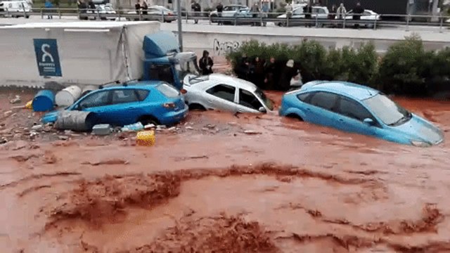 Fast-Moving Floodwater Imperils Vehicles and Passengers on Highway Outside Athens