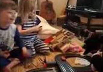 Grumpy Cat Has No Time for Family's New Race Track Toy