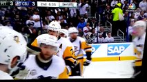 Zach Werenski of the Columbus Blue Jackets, gets hit in the face with a hockey puck.