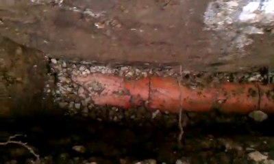 Digging down into Clay Weeper--basement window well install