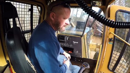 Loaded log truck is in the ditch