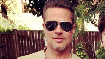 Brad Pitt KISSES Lizzy Caplan On World War II Set