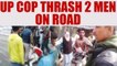 UP cop beats two men brutally on road, Watch shocking video | Oneindia News