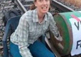 Protesters Lock Themselves to Barrel on Adani Railway Line