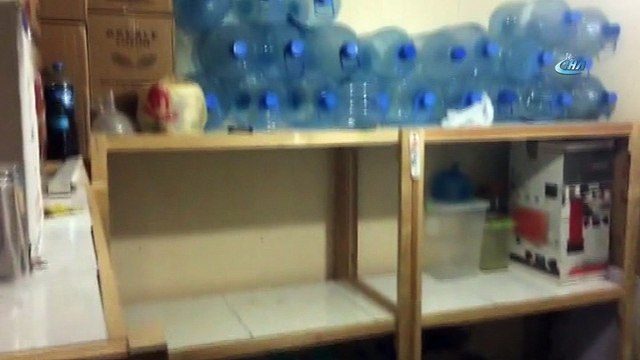 Kaçak içki imalatı yapan öğretim görevlisine polisten şafak baskını