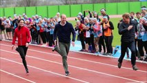 Kate Middleton, Prince William and Prince Harry as they take part in a relay race