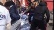 Deptford locals stealing water bottles for London Marathon Runners