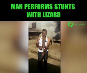 Cet homme fait des trucs incroyables avec un gros lézard... Risqué