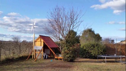 Fabriquer une cabane en bois avec son moulin à vent