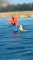 Hunters Rescue a Fawn Trapped on Ice