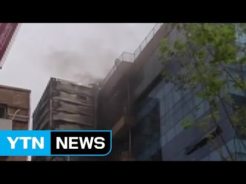 상가 건물 주차 타워서 불...6명 대피 / YTN