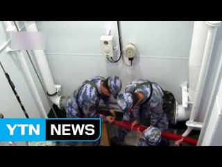 中 최신형 전함 서해에서 실전 훈련...피폭 대비 훈련도 / YTN