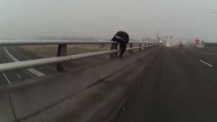 Heart-Stopping Moment Cop Stops Crying Man From Jumping To His Death