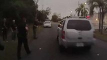 Oblivious Man Drives Through Crime Scene, Nearly Hitting Officers