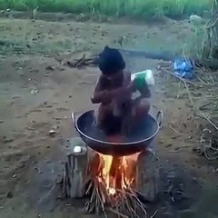 Funny Indian Boy Bath in Fire