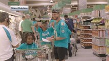 Miami Dolphins help 125 local students purchase food for Thanksgiving