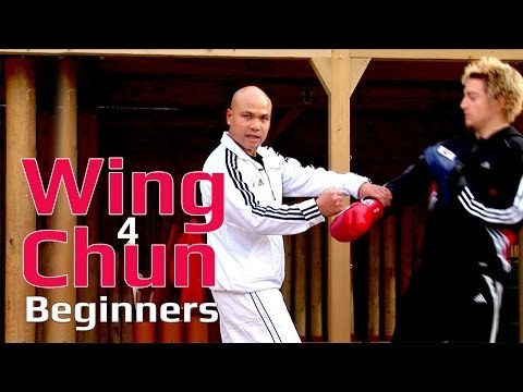Wing Chun for beginners lesson 48: Block, cover and Elbow to the chest (Pad work)