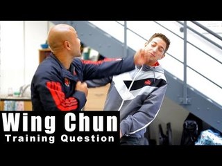 Wing Chun Training - Wing Chun how to deal with a hook. Q5