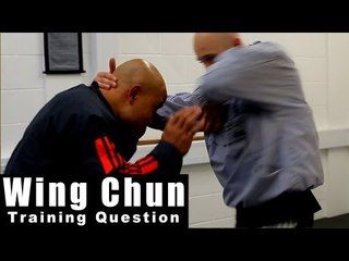 Wing Chun training - wing chun how to deal with clinch and elbow Q70