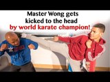 Master Wong gets kicked to the head by world karate champion