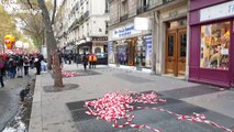 Anti-Macron protesters damage Paris shop fronts