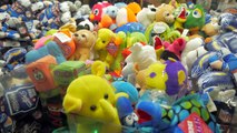 Cleaning out the claw machine for birthday presents at Dave and Busters! | The Crane Couple