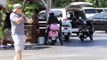 Kris Jenner Hits The Road On Pink Vespa, Asked If Kim Has Lost Baby Weight  [2013]
