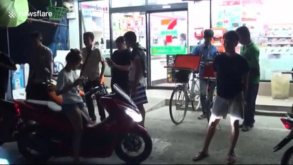 Woman finds 20ft long python sleeping in her toilet