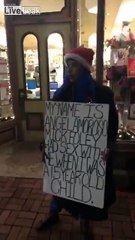 Wrestler Mick Foley gets berated outside a Christmas Santa meet and Greet