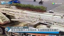 Woman on a scooter panic brakes then gets killed after being ran over by a crane truck