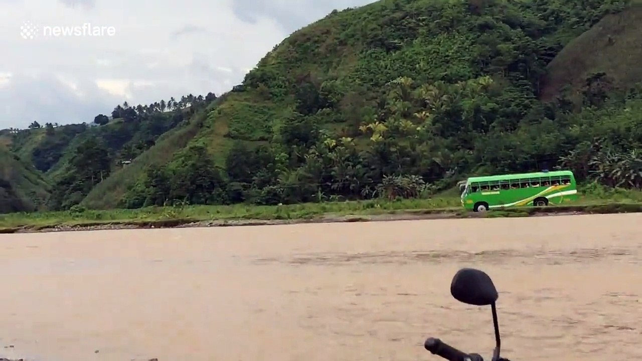 School bus driver takes risky shortcut through flooded river