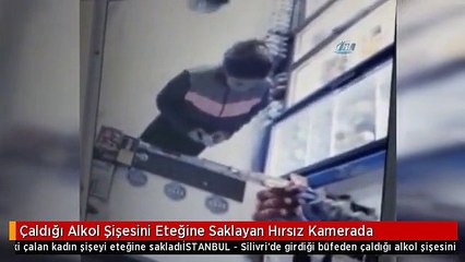 Çaldığı Alkol Şişesini Eteğine Saklayan Hırsız Kamerada