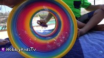 Worlds Biggest SLINKY Surprise Egg! POOL Party   Toys, Puppy Robot Toots HobbyKidsTV