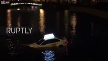 Lucky escape! Chilling moment passengers trapped in SINKING car in Moika River