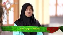 فتاه اندونيسيه تملك صوت فى قمة الروعه فى قرأة القرأن الكريم .