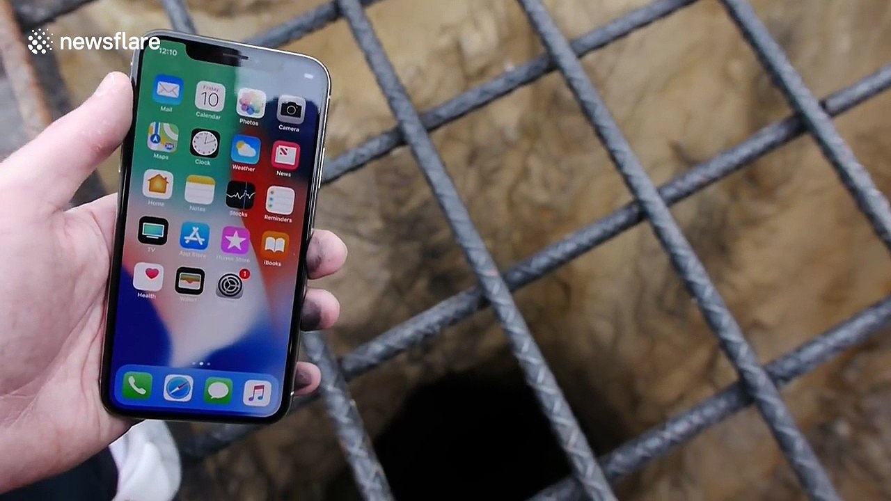 Crazy tech blogger drops a iPhone X down a mine shaft