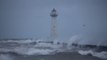 Wind Whips Lighthouse Pier Along Lake Ontario in New York