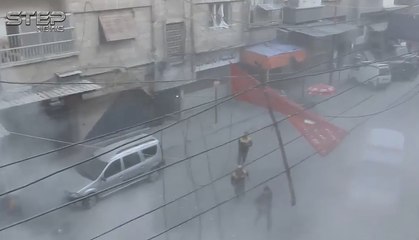 Photographer Moves Away From Window as Loud Booms Draw Closer in Douma