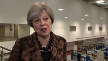 May: We will honour EU commitments