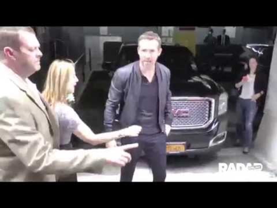 Ryan Reynolds signs autographs in NYC