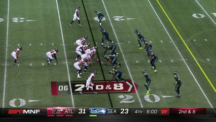 Terron Ward throws Bradley McDougald to turf with wicked stiff arm