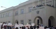 Crowds Chant Outside Parliament as Mugabe Impeachment Process Begins