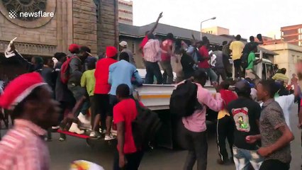 Celebrations erupt outside parliament after Mugabe resigns