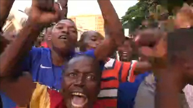 Zimbabweans celebrate after President Robert Mugabe resigns